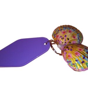 Vibrant Seashell Keychain with Purple Tag
